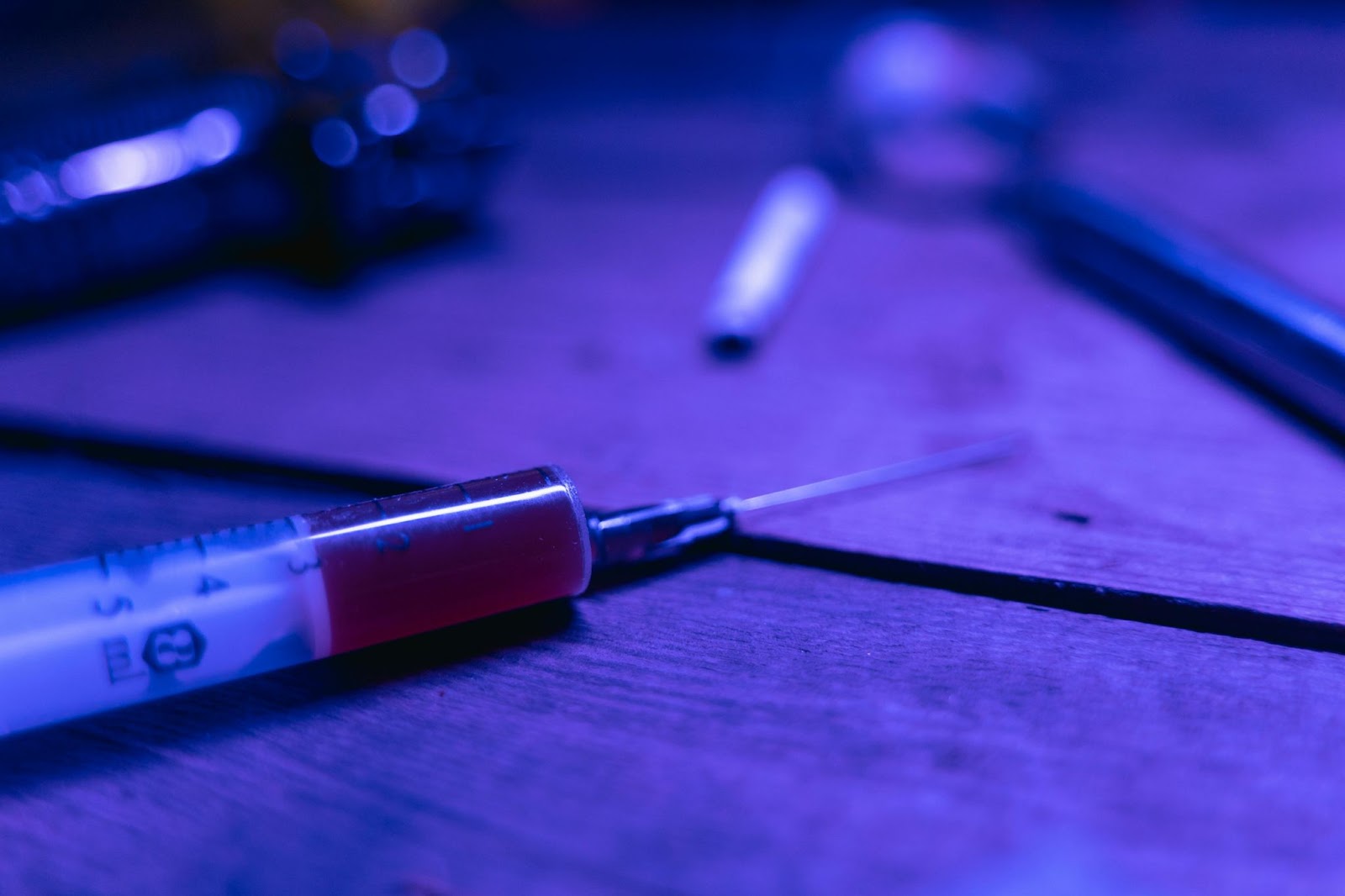 A syringe filled with liquid, commonly linked to heroin use