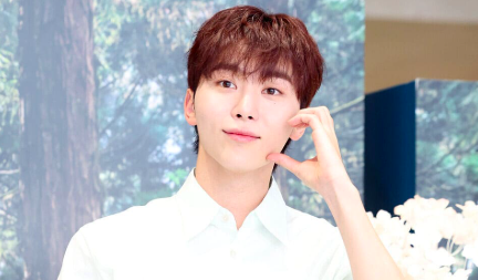 This contains an image of SEVENTEEN Seungkwan