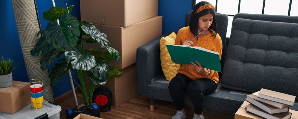 A woman sorting out her living room