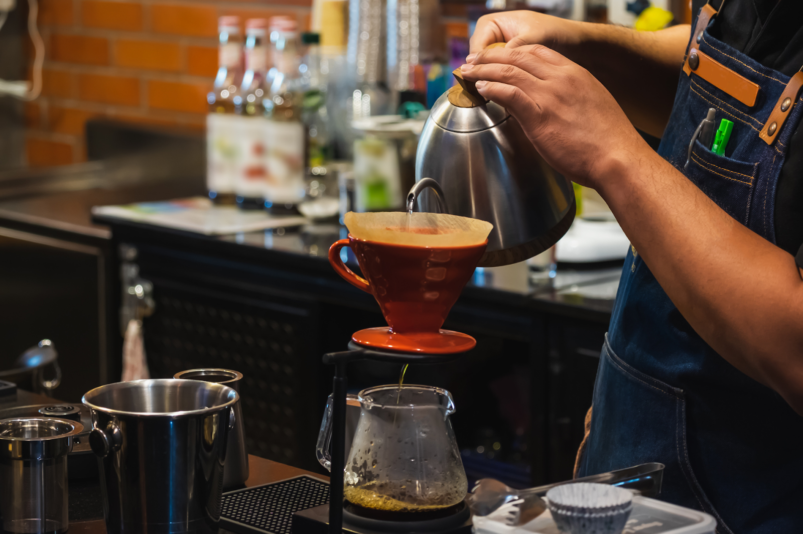 A barista making V60 Coffee 