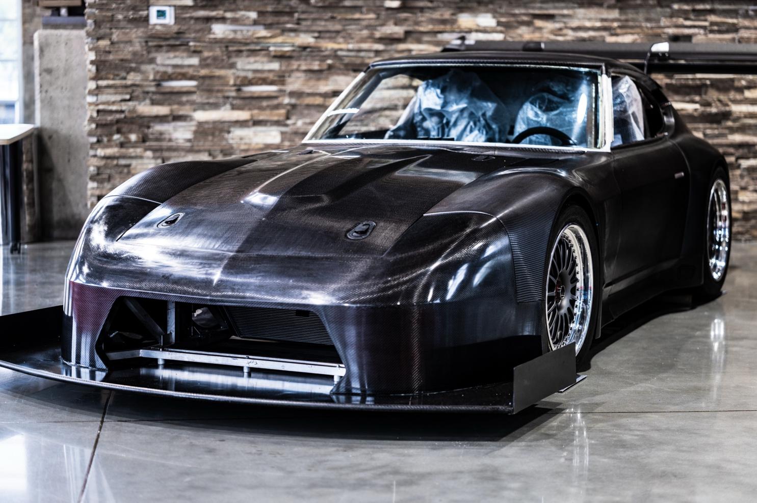 A black car in a room

AI-generated content may be incorrect.