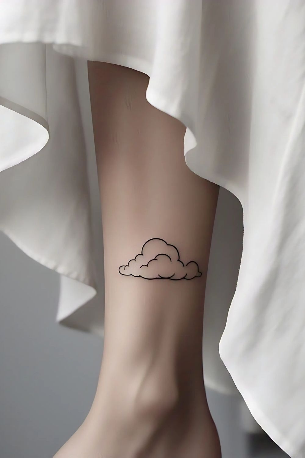Small Cloud Tattoo Leg