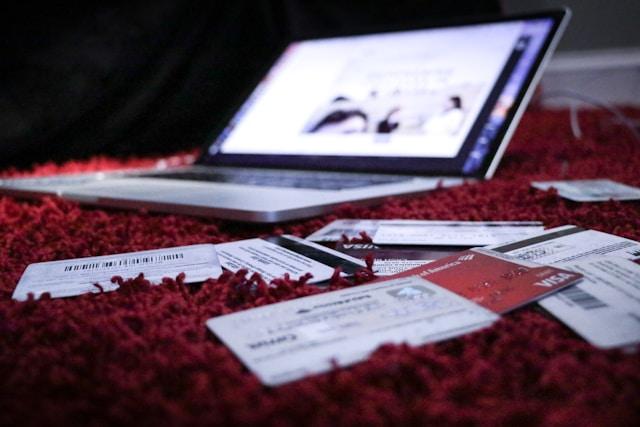 Credit card next to a laptop
