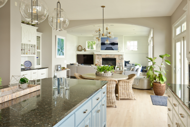 pros and cons of open concept floor plans kitchen and dining space with granite island and table custom built michigan