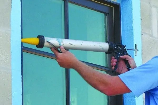 Sealing windows to prevent leaks.