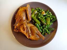 A plate of food on a white surface

Description automatically generated