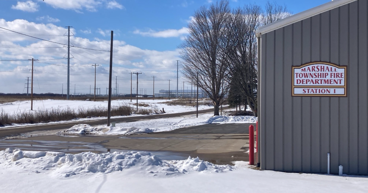 BlueOval Battery Park looms on the horizon, viewed from the Marshall Township Fire Department and Township Hall.