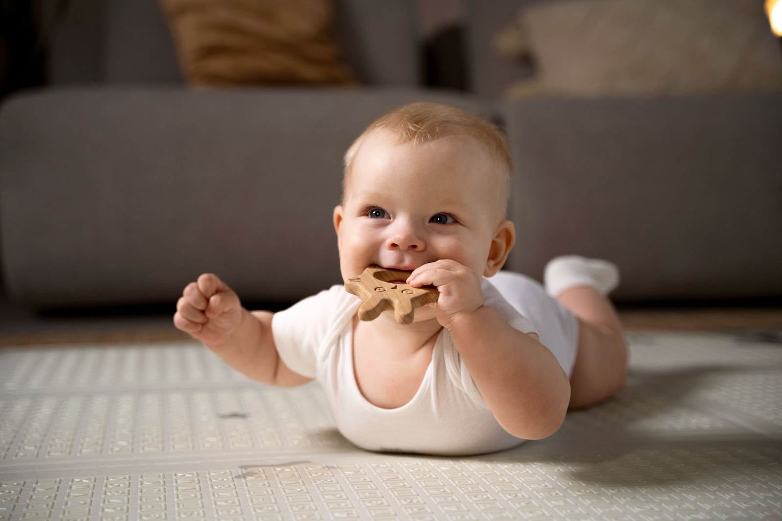 Baby chewing on a teething toy