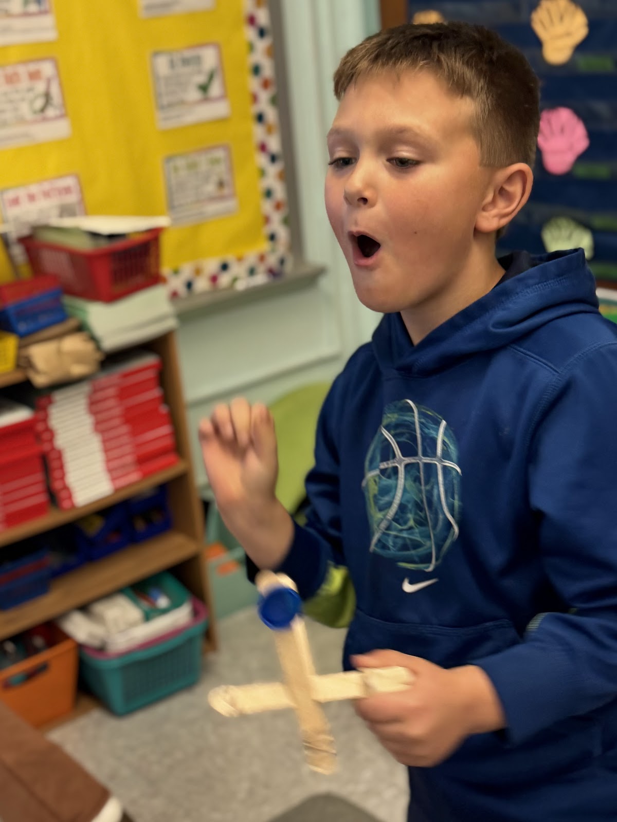 Image of student launching a homemade catapult