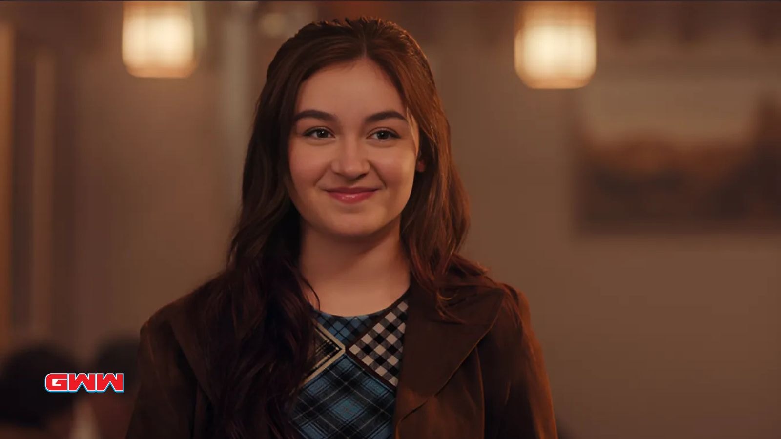 Anna Cathcart as Kitty Song Covey smiling in XO Kitty Season 2