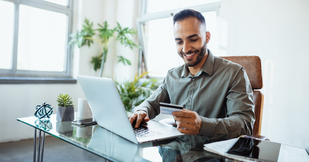 A business owner researching their next business printer online.