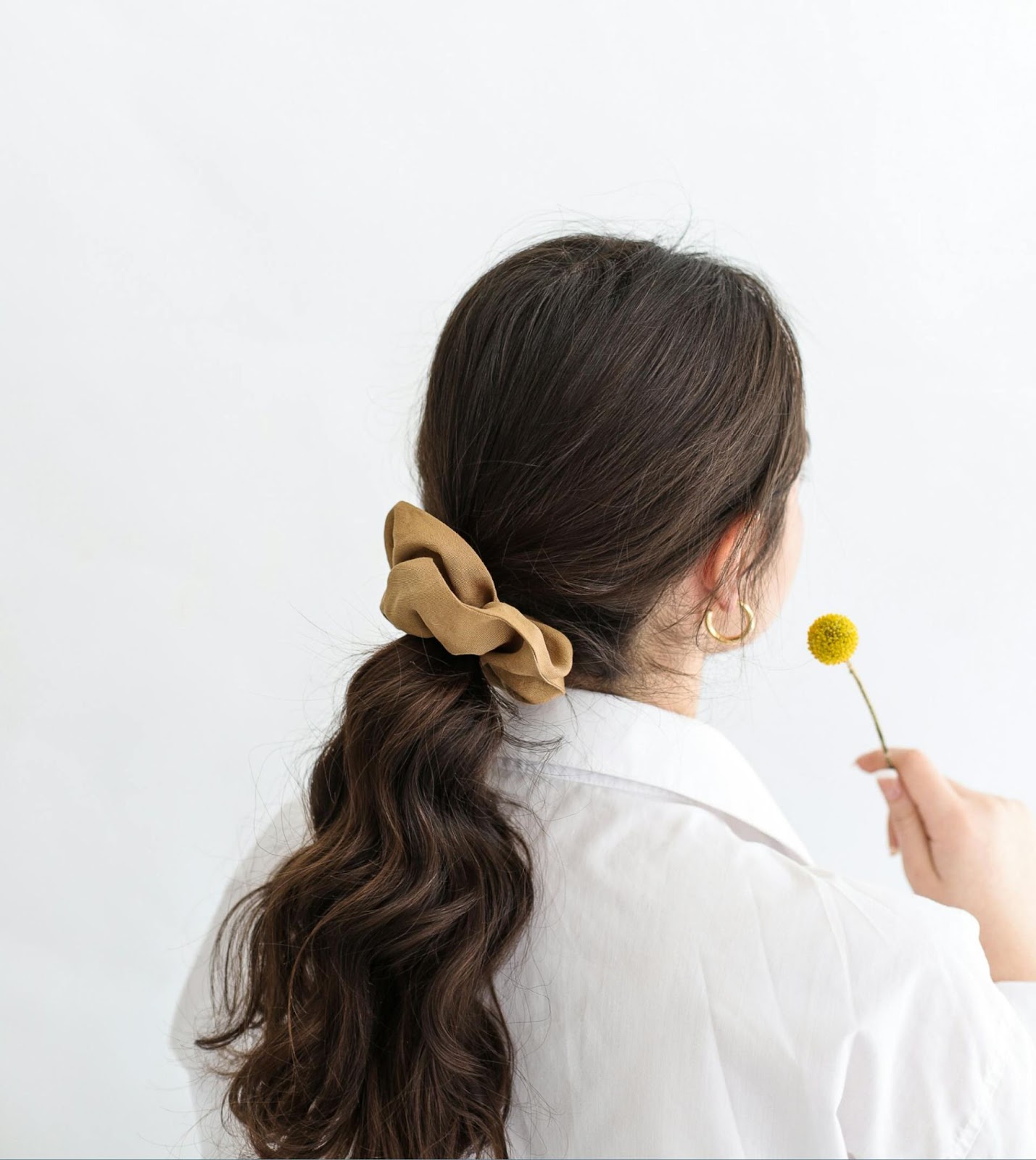 A rare view of a woman rocking her hair