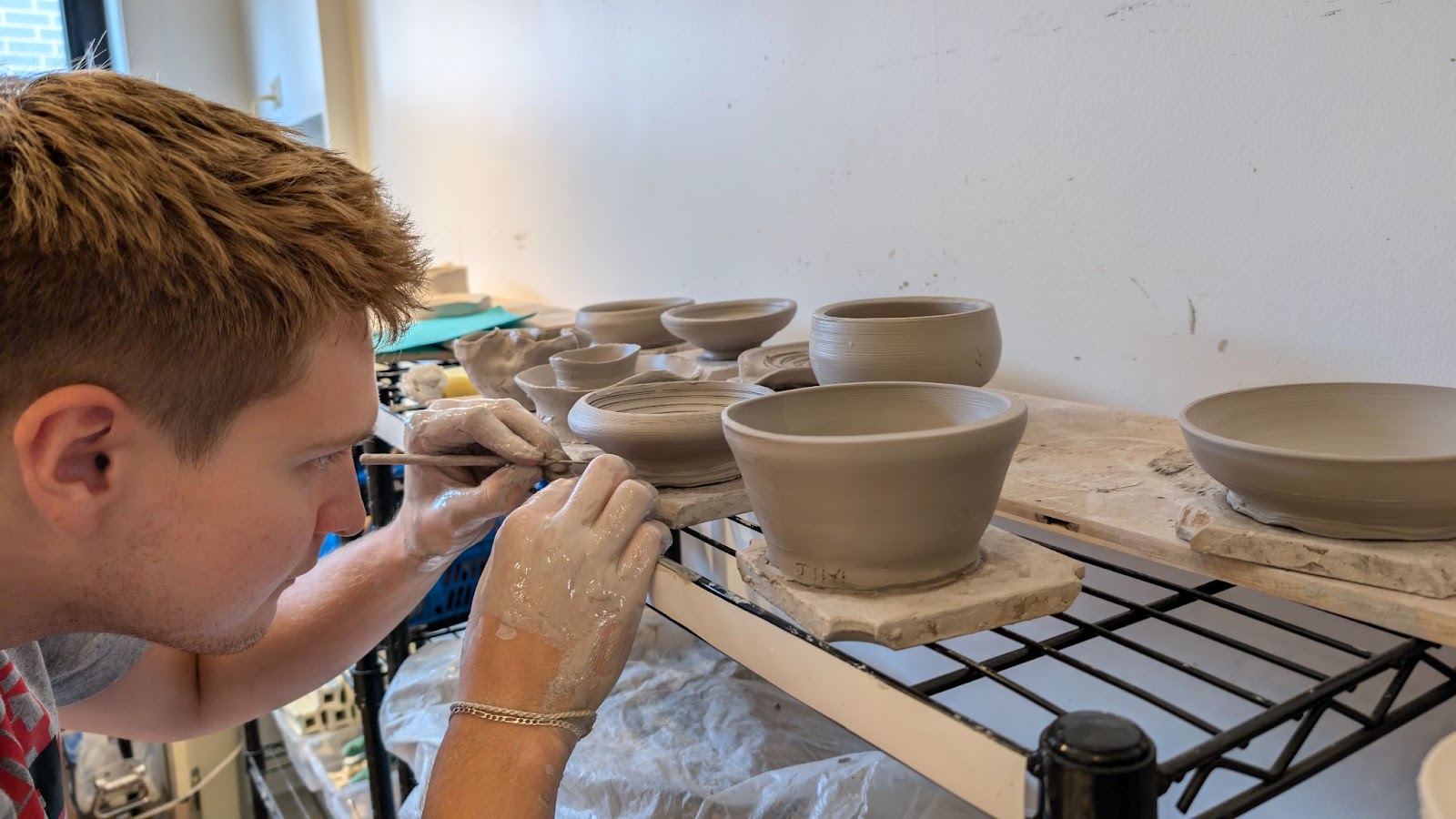 Grady detailing his pottery