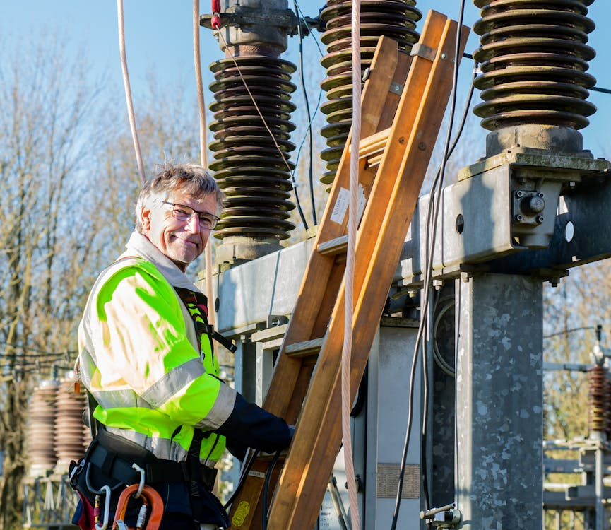 man working on electrical wires