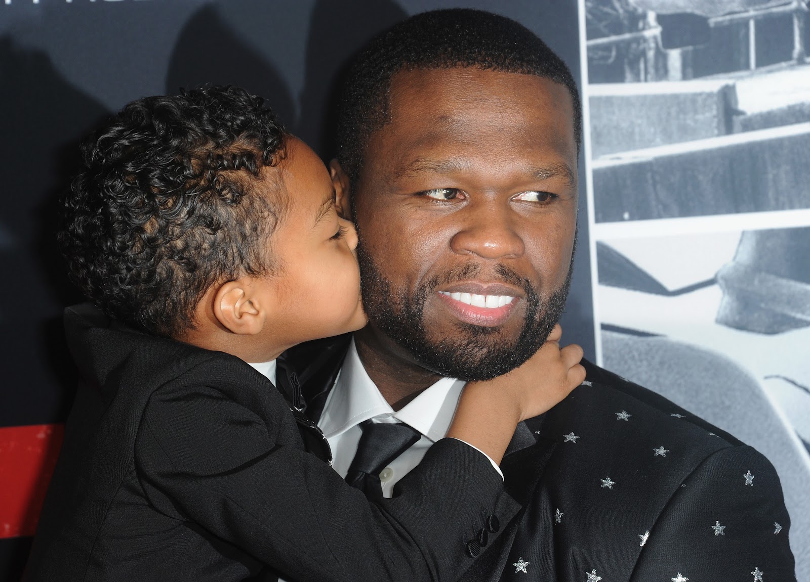 50 Cent and Sire Jackson arrive for the premiere of "Den Of Thieves" on January 17, 2018, in Los Angeles, California. | Source: Getty Images