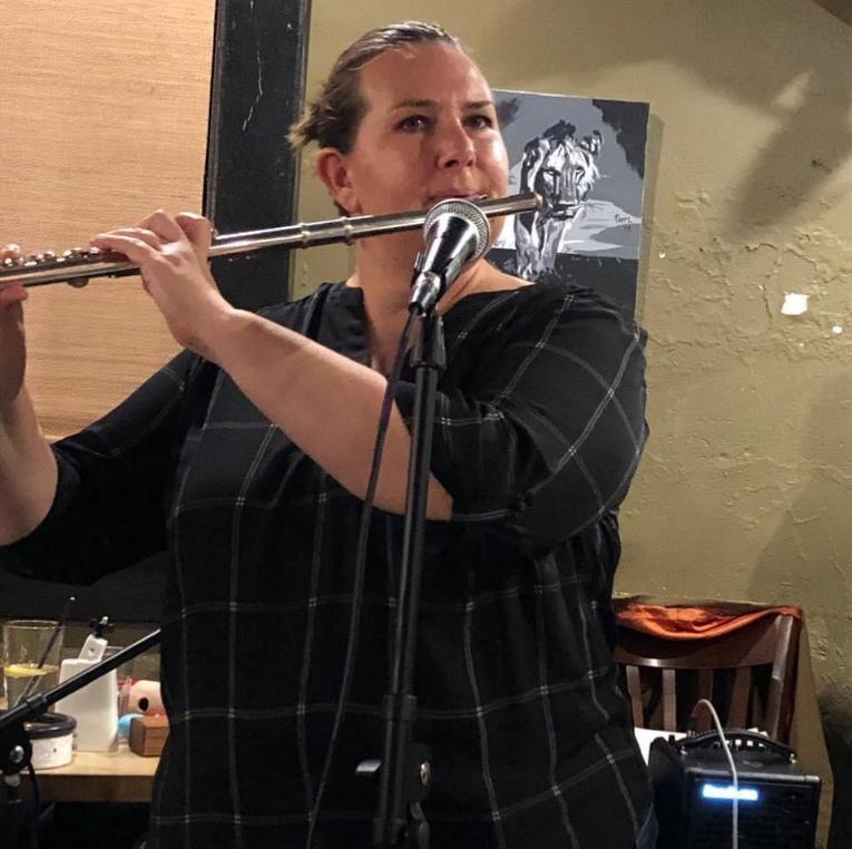 A person playing a flute