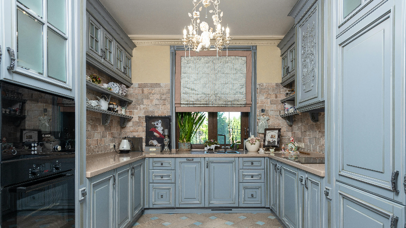 a relaxing kitchen environment with a cozy chandelier  