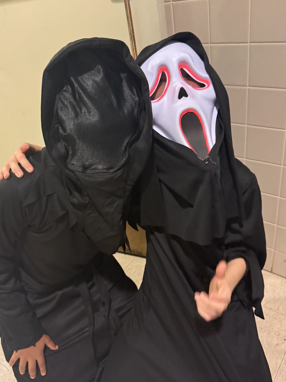 image of students and teacher in costume for Halloween