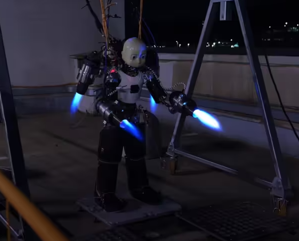 A robot with blue lights

Description automatically generated