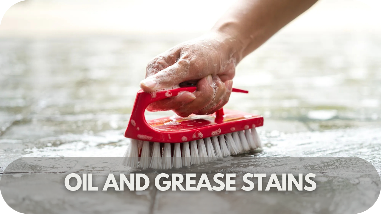 Tackling oil and grease stains on pavers with effective cleaning solutions.