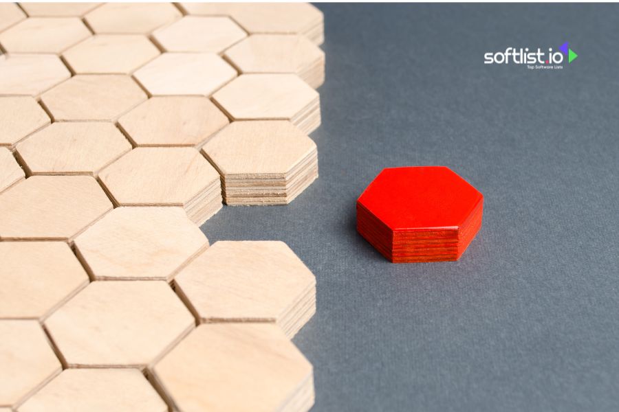 Hexagonal red piece next to a grid of wooden hexagons with Softlist.io