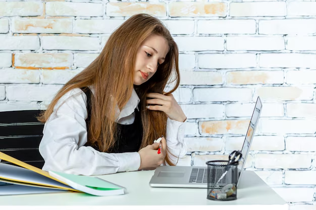 A student is studying and researching content for a blog post