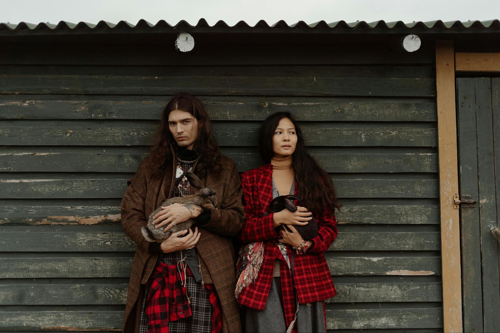Two people wearing plaid: what to wear to a creative festival in the UK
