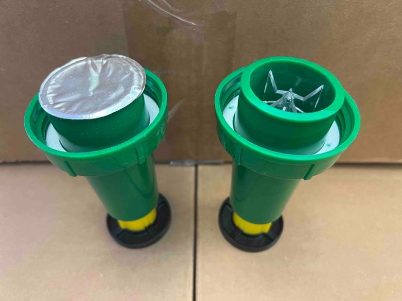 A pair of green and yellow objects

Description automatically generated