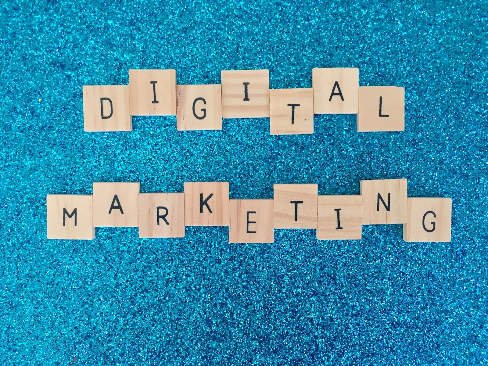 Words “digital marketing” on wooden tiles. 