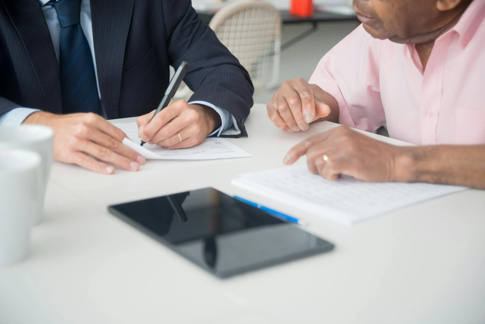 Documents being signed in an office