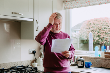 signs that its time for a kitchen remodel homeowner reacting to high energy bills custom built michigan