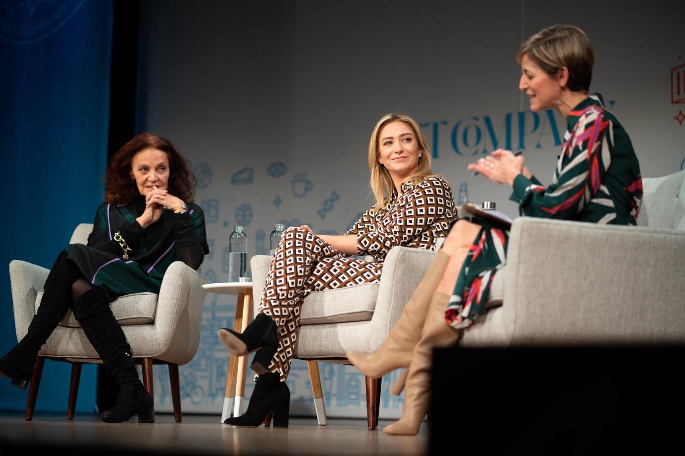 A group of women sitting in chairs Description automatically generated