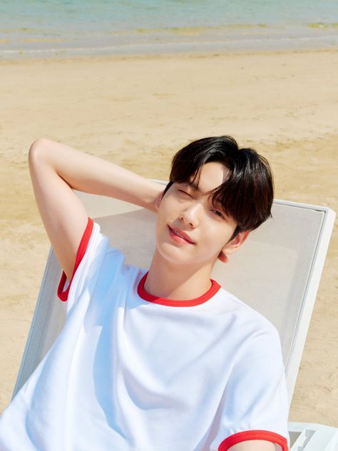 This contain an image of soobin on whiter and red cloth 