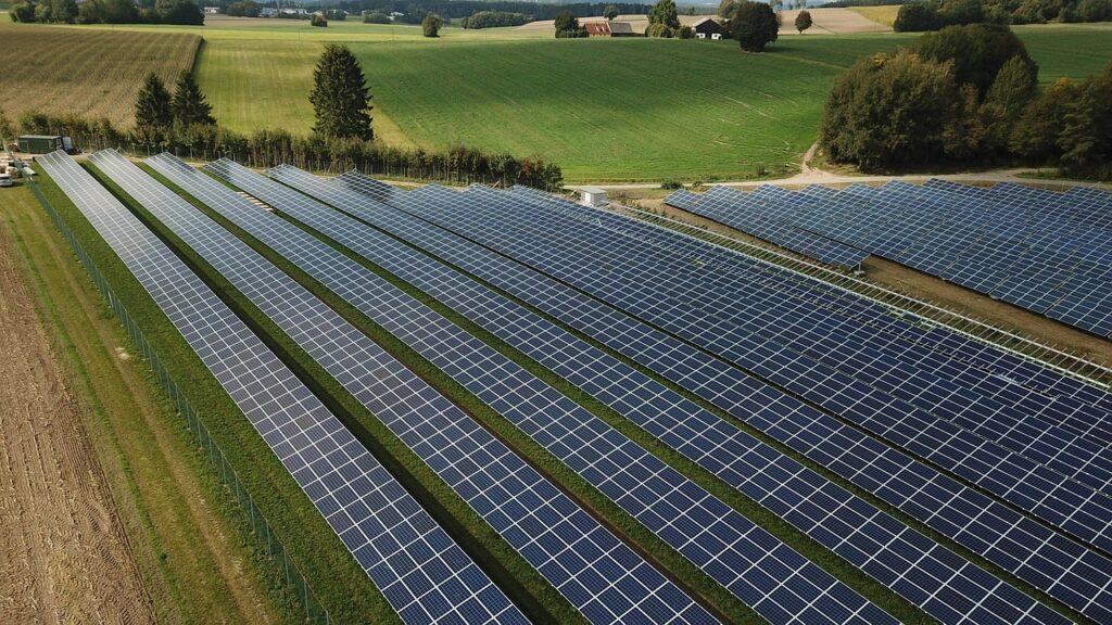 A solar panels in a field

Description automatically generated