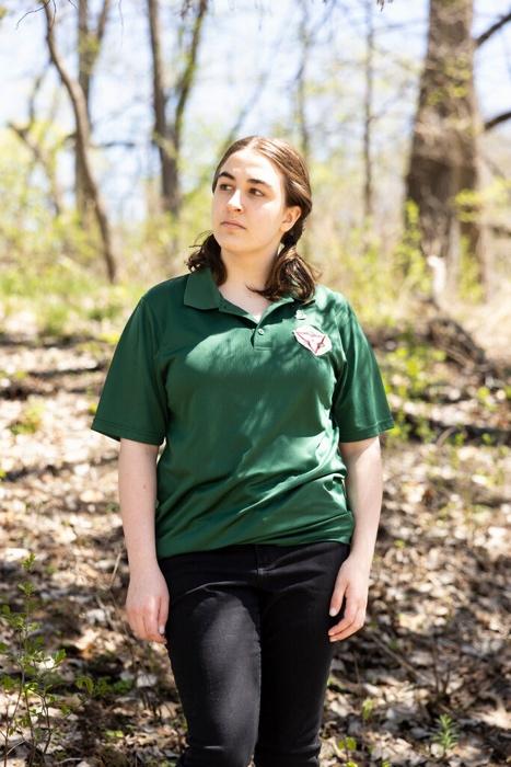 A person in a green shirt

AI-generated content may be incorrect.