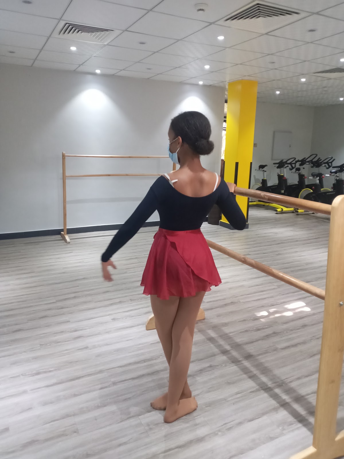 Leotard Ballet student in Uganda wearing proper ballet attire for class