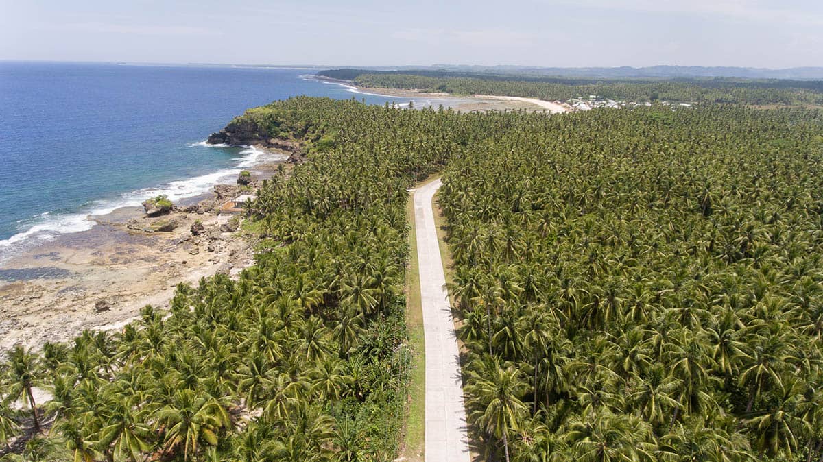A road beside a beach in Pilar Siargao