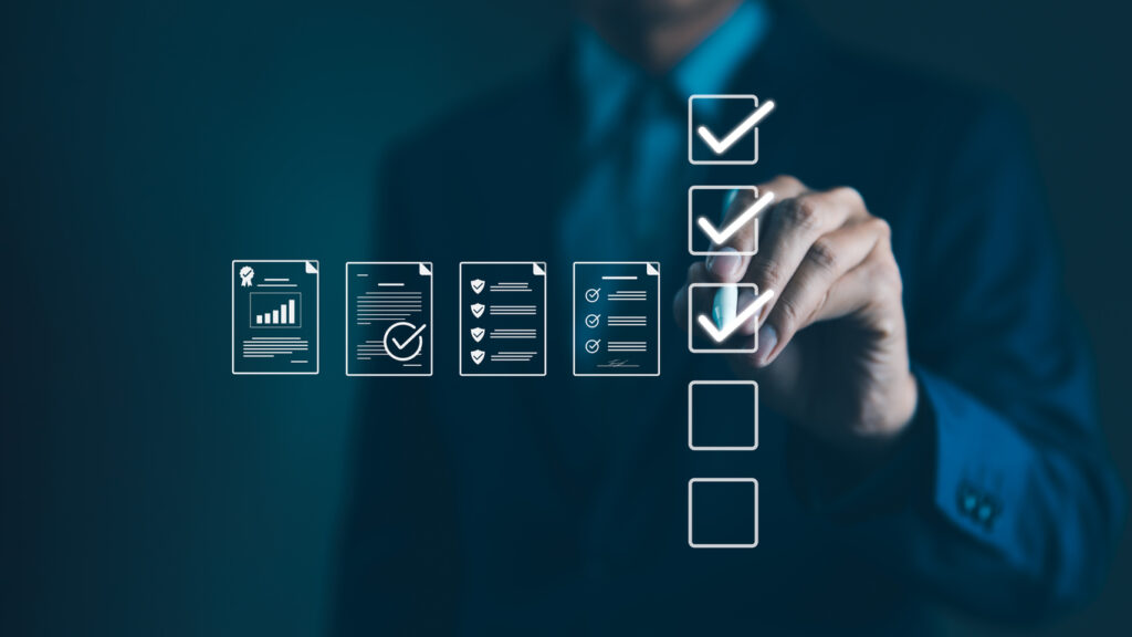 Business professional completing digital checklist for compliance and documentation