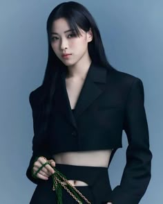 This contains an image of Ryujin on a black outfit 