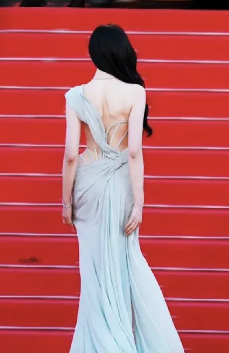 This contain an image of  Claudia Kim Kim Soo Hyun white dress walking on red carpet 