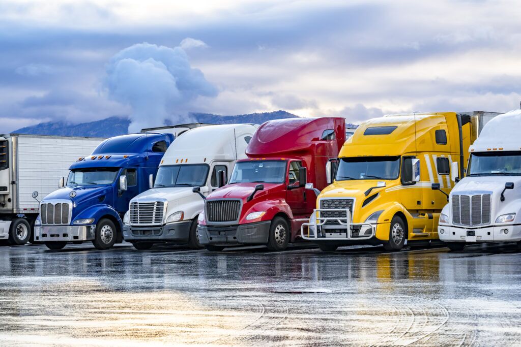 semi trucks lined up at a rest stop in indiana