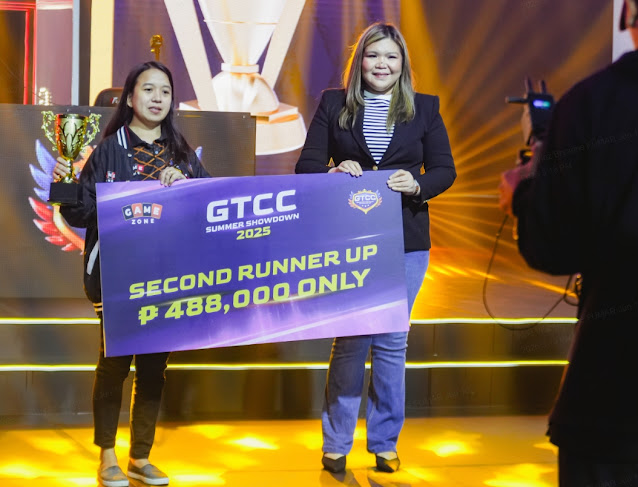 Cesha receiving her rewards