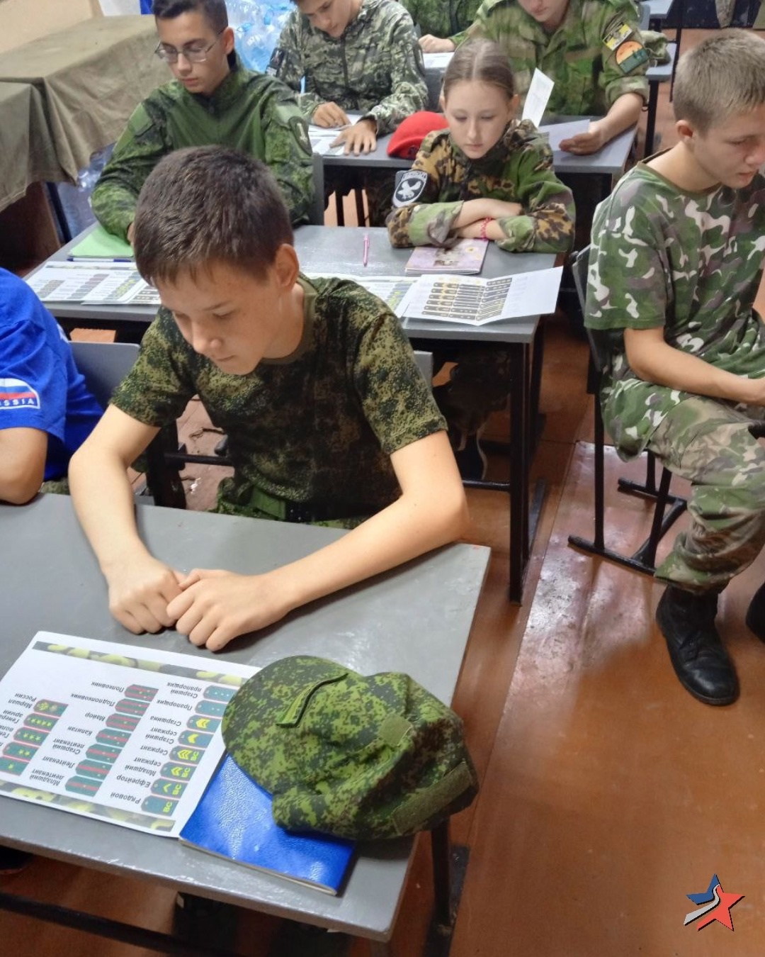 How the academic year 2024/2025 started in the occupied Crimea: a lesson with Putin, militaristic events - картинка 6