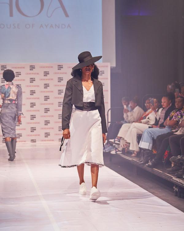 Model walks the runway in House of Ayanda designs at Soweto Fashion Week