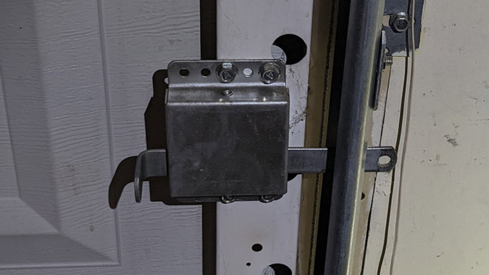 A close-up of a garage door lock mechanism