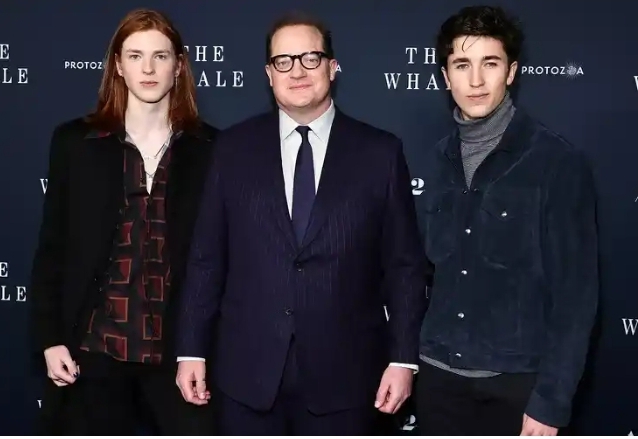 Leland Francis Fraser with his father and brother at an event