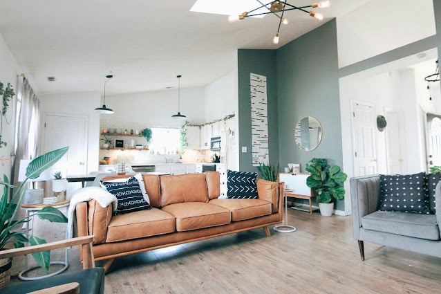 Modern living room with lots of greenery.