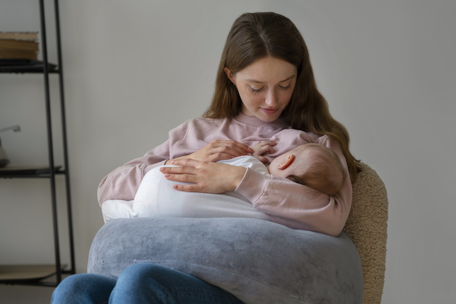 A mother breastfeeding her newborn