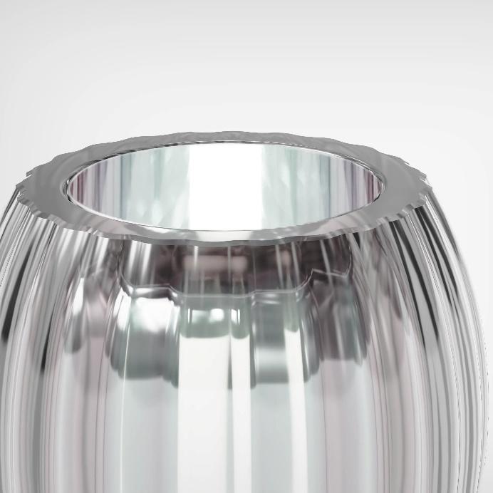 A close-up of a silver object

Description automatically generated