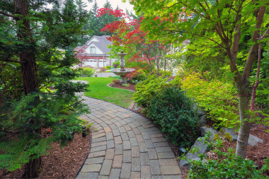 michigan hardscaping ideas for every season brick walkway through trees in front yard custom built okemos